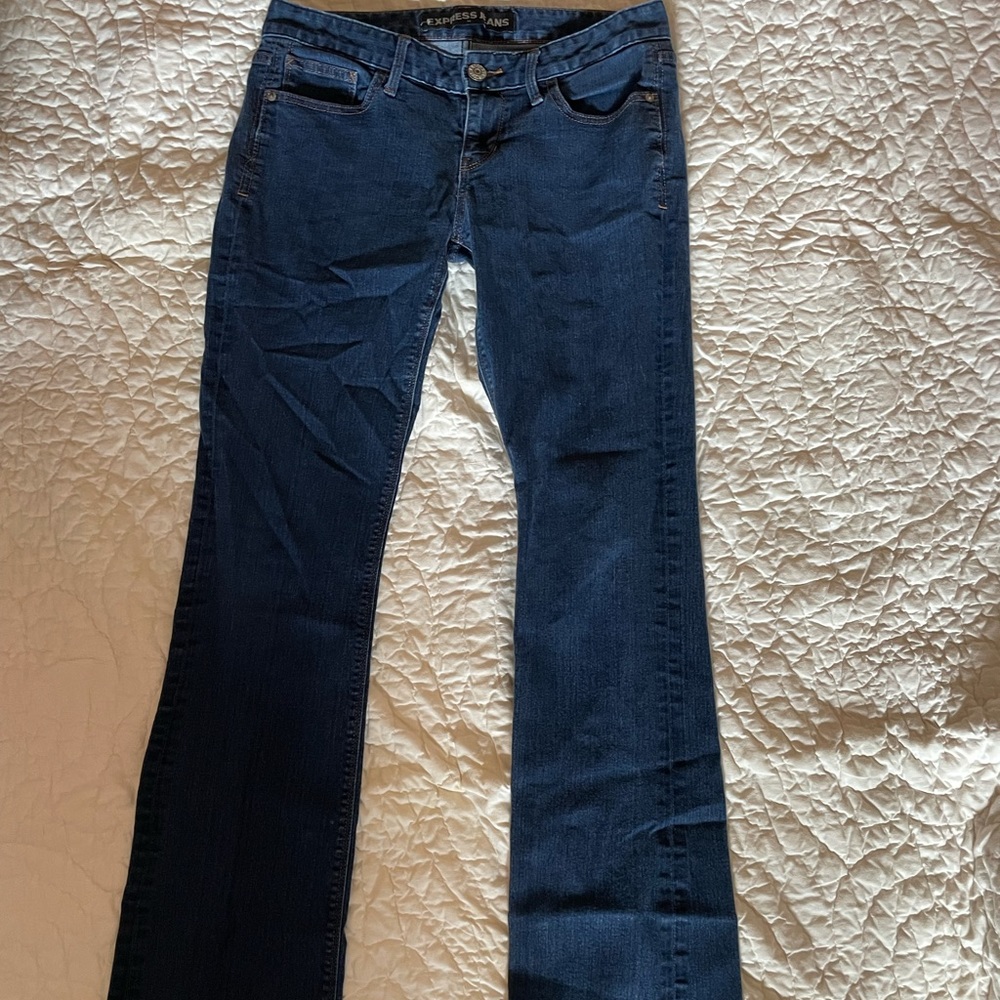 Express dark wash skinny jeans
